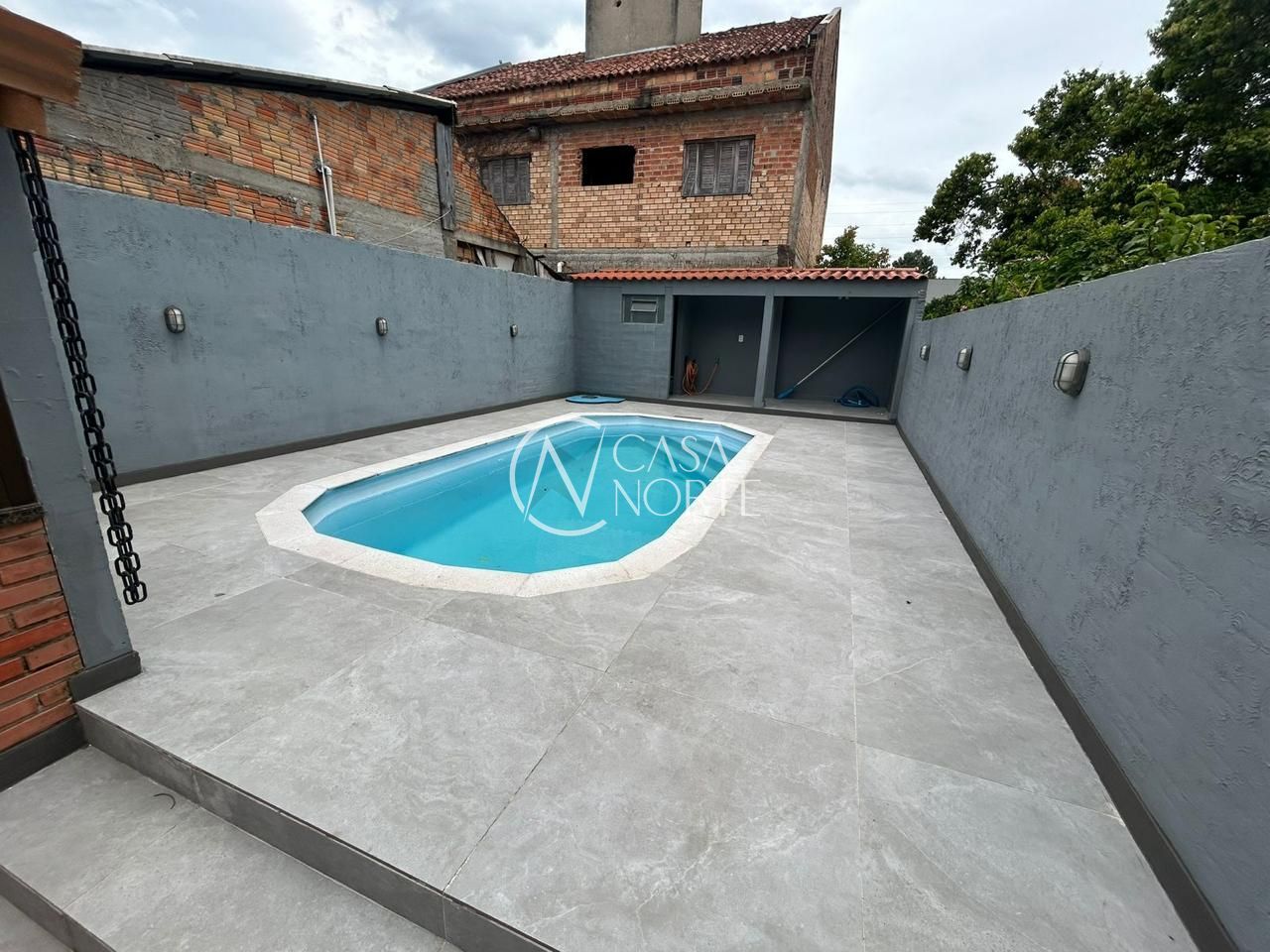 Casa à venda com 4 quartos, 67m², 2 suítes, 2 vagas, Rua Balduíno Boattini no bairro Hípica em Porto Alegre