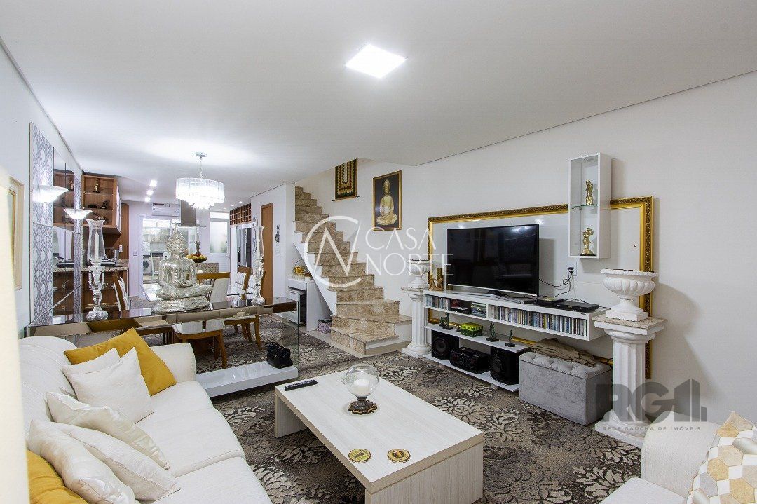 Casa à venda com 3 quartos, 161m², 3 suítes, 2 vagas, Rua Heitor Kramer no bairro Guarujá em Porto Alegre