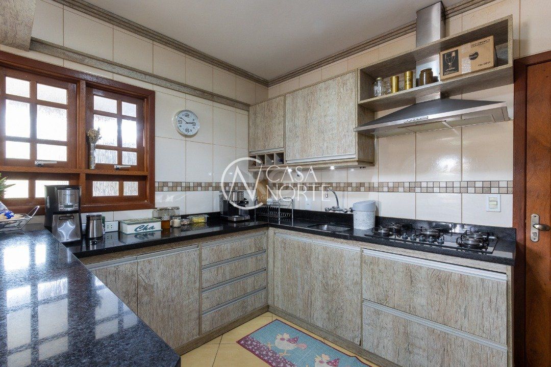 Casa à venda com 3 quartos, 190m², 1 suíte, 2 vagas, Rua do Jesuíno - Lado Ímpar no bairro Boa Vista do Sul em Porto Alegre