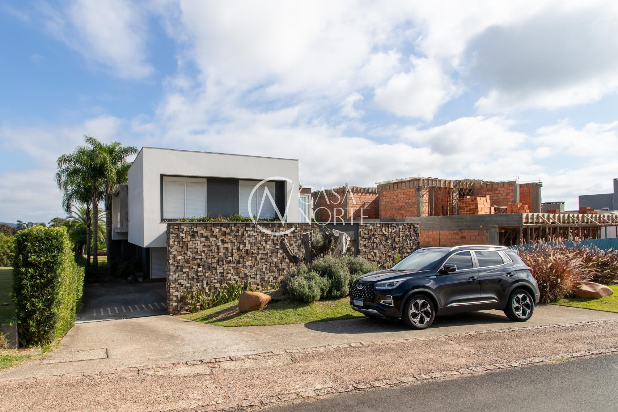 Casa de Condomínio à venda com 4 quartos, 541m², 4 suítes, 5 vagas, Avenida Juca Batista no bairro Belém Novo em Porto Alegre