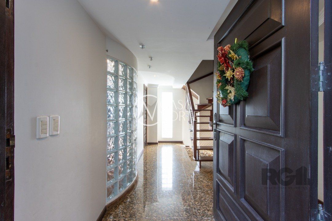 Casa à venda com 5 quartos, 417m², 3 suítes, 4 vagas, Rua Fernando Osório no bairro Teresópolis em Porto Alegre