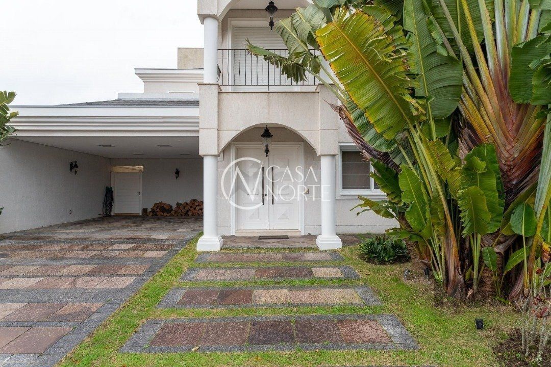 Casa de Condomínio à venda com 3 quartos, 420m², 2 suítes, 4 vagas, Avenida Juca Batista no bairro Belém Novo em Porto Alegre