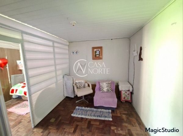 Casa à venda com 2 quartos, 102m², 2 vagas, Beco Domience Silva no bairro Ponta Grossa em Porto Alegre