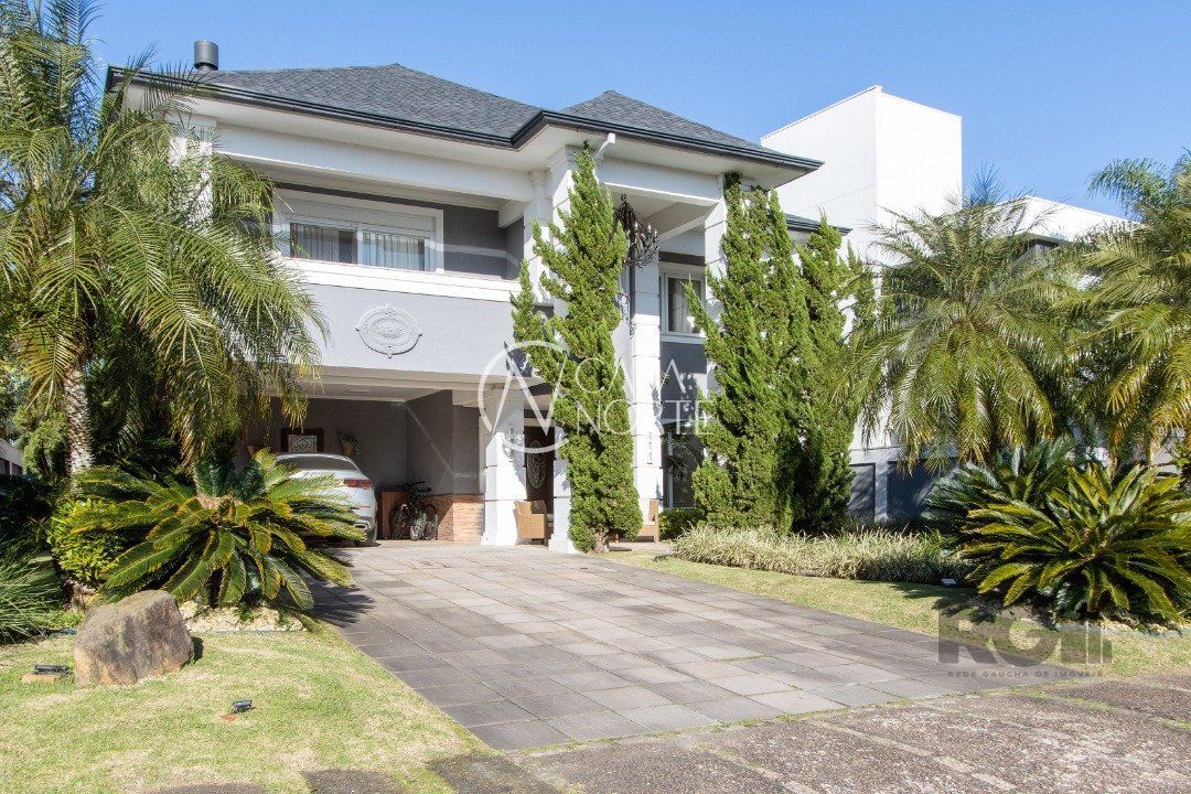 Casa de Condomínio à venda com 3 quartos, 527m², 3 suítes, 4 vagas, Avenida Juca Batista no bairro Terraville em Porto Alegre