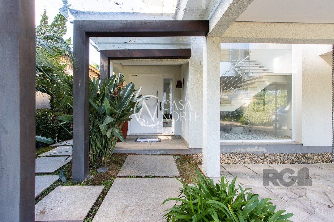 Casa de Condomínio à venda com 5 quartos, 457m², 5 suítes, 4 vagas, Avenida Coronel Marcos no bairro Pedra Redonda em Porto Alegre
