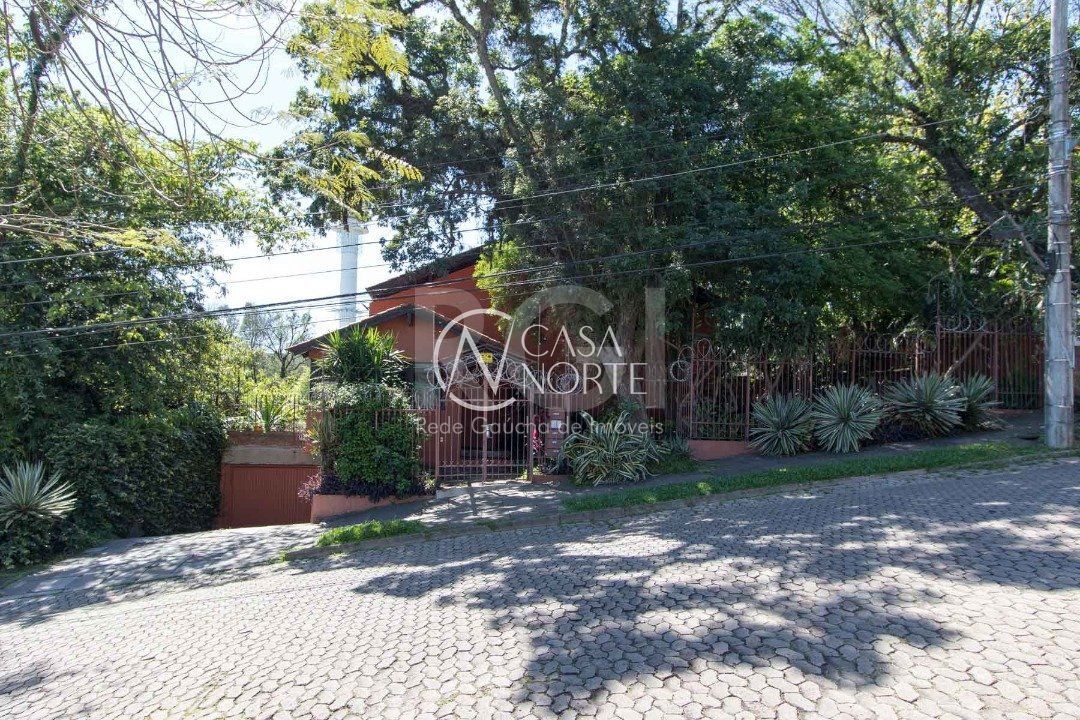 Casa de Condomínio à venda com 3 quartos, 342m², 1 suíte, 3 vagas, Rua Hipolito da Costa no bairro Santa Tereza em Porto Alegre