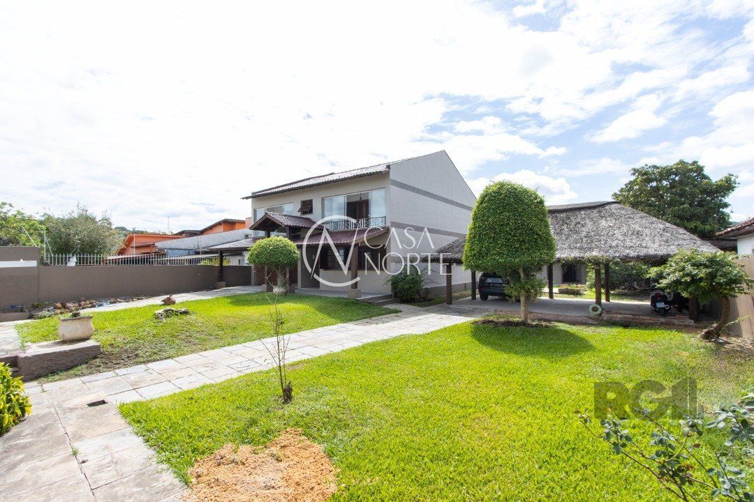 Casa à venda com 4 quartos, 256m², 1 suíte, 3 vagas, Avenida Guaíba no bairro Serraria em Porto Alegre