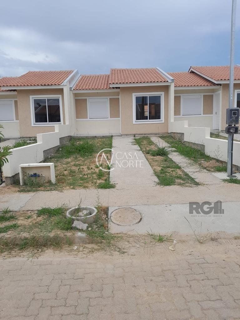 Casa à venda com 2 quartos, 47m², 1 vaga, Rua Sete Mil e Quatorze no bairro Restinga em Porto Alegre