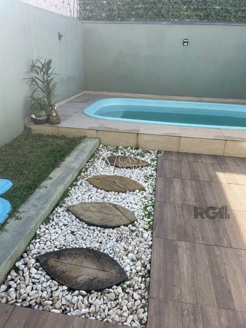 Casa à venda com 3 quartos, 176m², 1 suíte, 2 vagas, Rua Claudio da Silva Pinto no bairro Espírito Santo em Porto Alegre