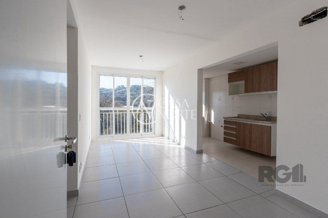 Apartamento à venda com 2 quartos, 57m², 1 suíte, 1 vaga, Rua Walton Pontes Carpes no bairro Vila Nova em Porto Alegre