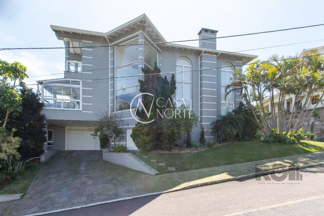 Casa de Condomínio à venda com 4 quartos, 483m², 2 suítes, 3 vagas, Rua Alcebiades Antônio dos Santos no bairro Nonoai em Porto Alegre