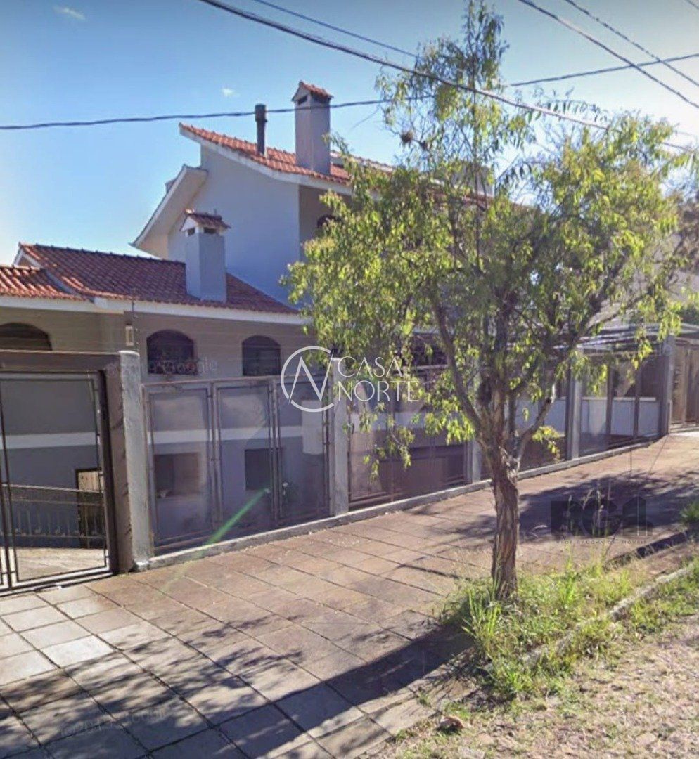 Casa à venda com 5 quartos, 648m², 5 suítes, 7 vagas, Rua Professor Xavier Simões no bairro Sétimo Céu em Porto Alegre