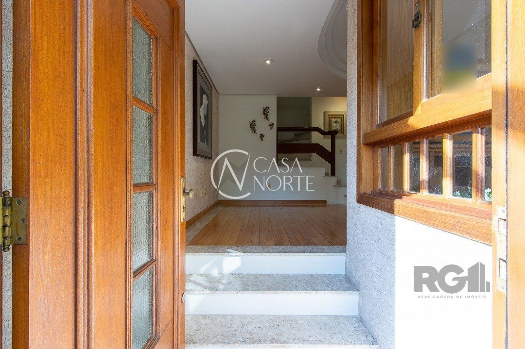 Casa de Condomínio à venda com 4 quartos, 216m², 1 suíte, 3 vagas, Rua Ernesto Paiva no bairro Tristeza em Porto Alegre