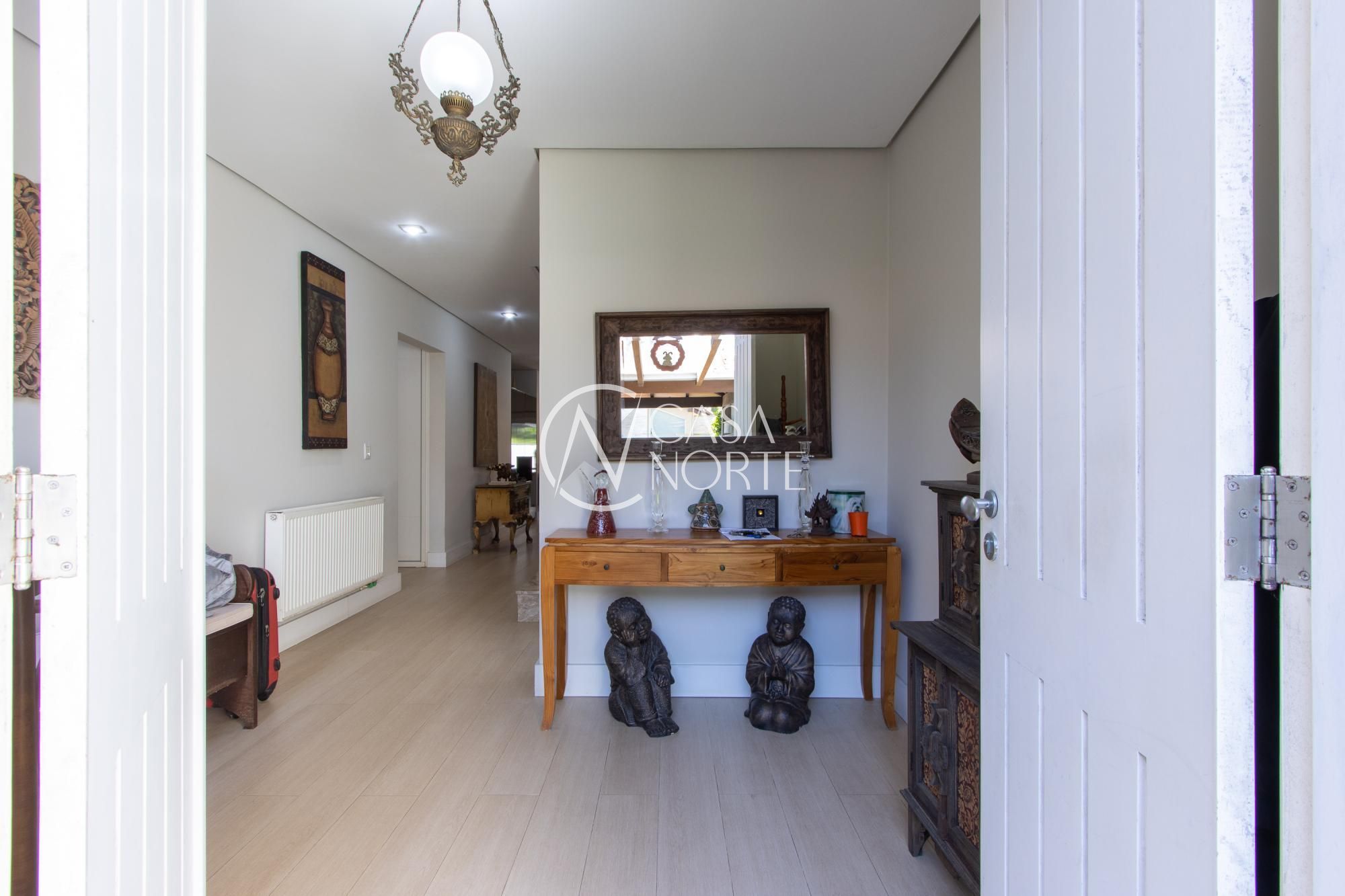 Casa de Condomínio à venda com 3 quartos, 294m², 3 suítes, 3 vagas, Avenida Juca Batista no bairro Belém Novo em Porto Alegre