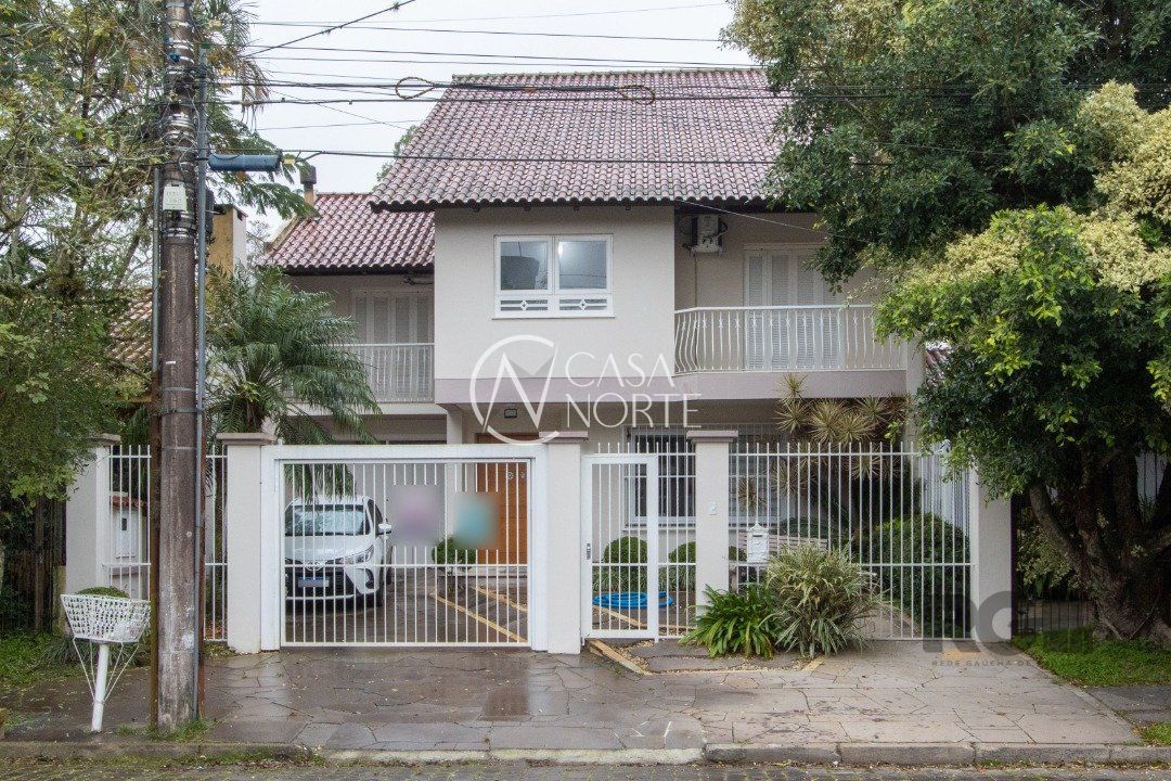 Casa à venda com 3 quartos, 309m², 2 suítes, 3 vagas, Rua Adao Pinheiro da Silva no bairro Ipanema em Porto Alegre