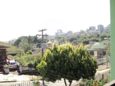 Casa à venda com 3 quartos, 331m², 1 suíte, Rua Hipolito da Costa no bairro Santa Tereza em Porto Alegre