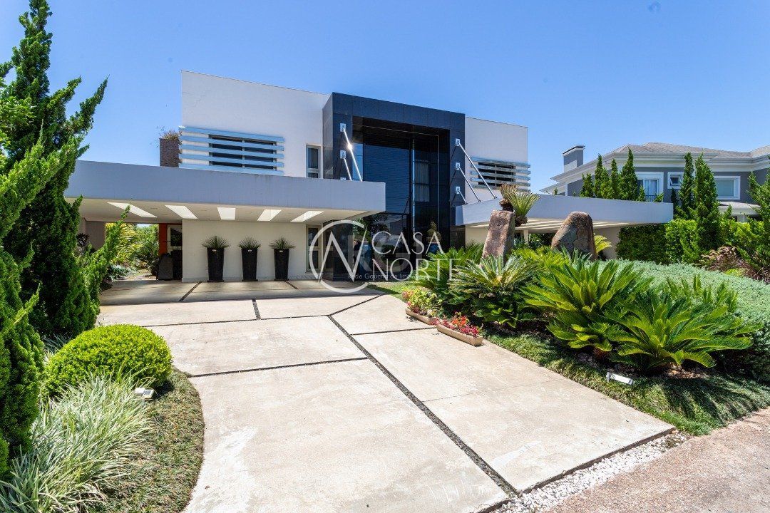 Casa de Condomínio à venda com 5 quartos, 720m², 5 suítes, 4 vagas, Avenida Juca Batista no bairro Belém Novo em Porto Alegre
