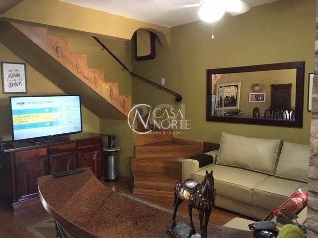 Casa à venda com 3 quartos, 140m², 2 vagas, Rua Vacaria no bairro Hípica em Porto Alegre