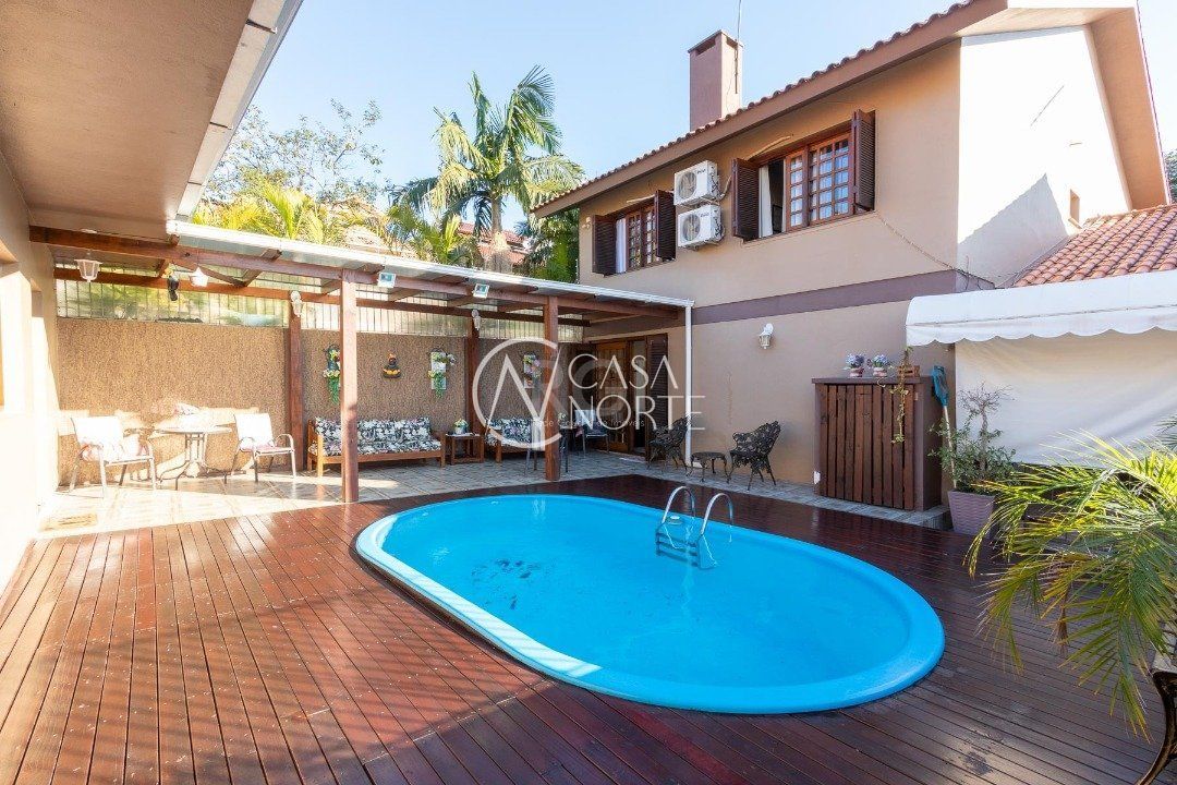 Casa à venda com 4 quartos, 258m², 1 suíte, 3 vagas, Rua Ari Peixoto Martins no bairro Espírito Santo em Porto Alegre