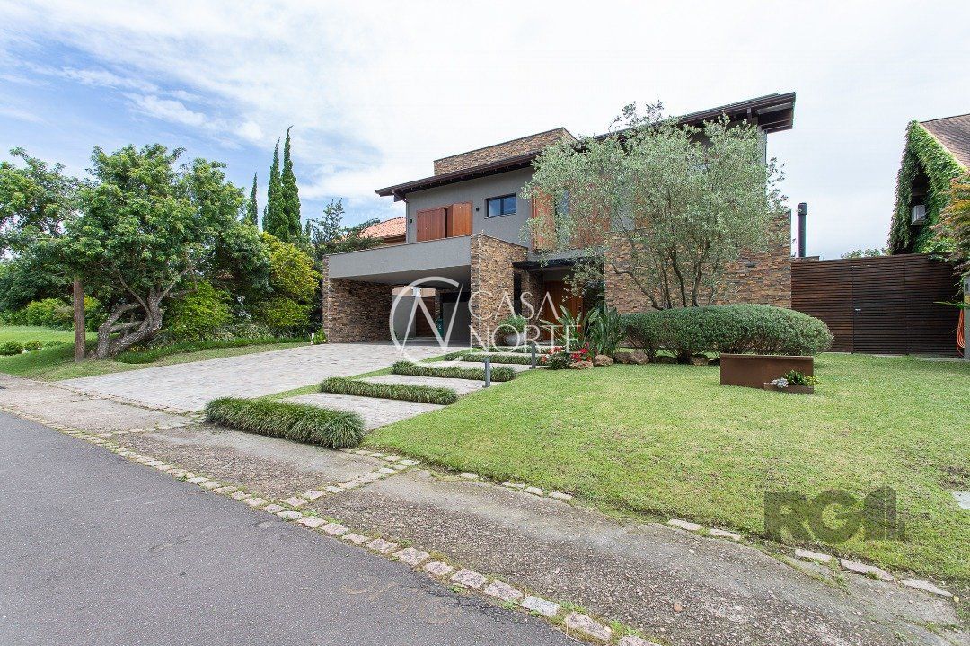 Casa de Condomínio à venda com 4 quartos, 460m², 4 suítes, 4 vagas, Avenida Juca Batista no bairro Terraville em Porto Alegre