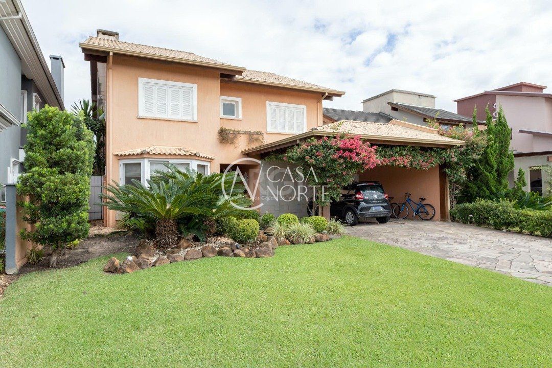 Casa de Condomínio à venda com 4 quartos, 386m², 4 suítes, 4 vagas, Avenida Juca Batista no bairro Belém Novo em Porto Alegre