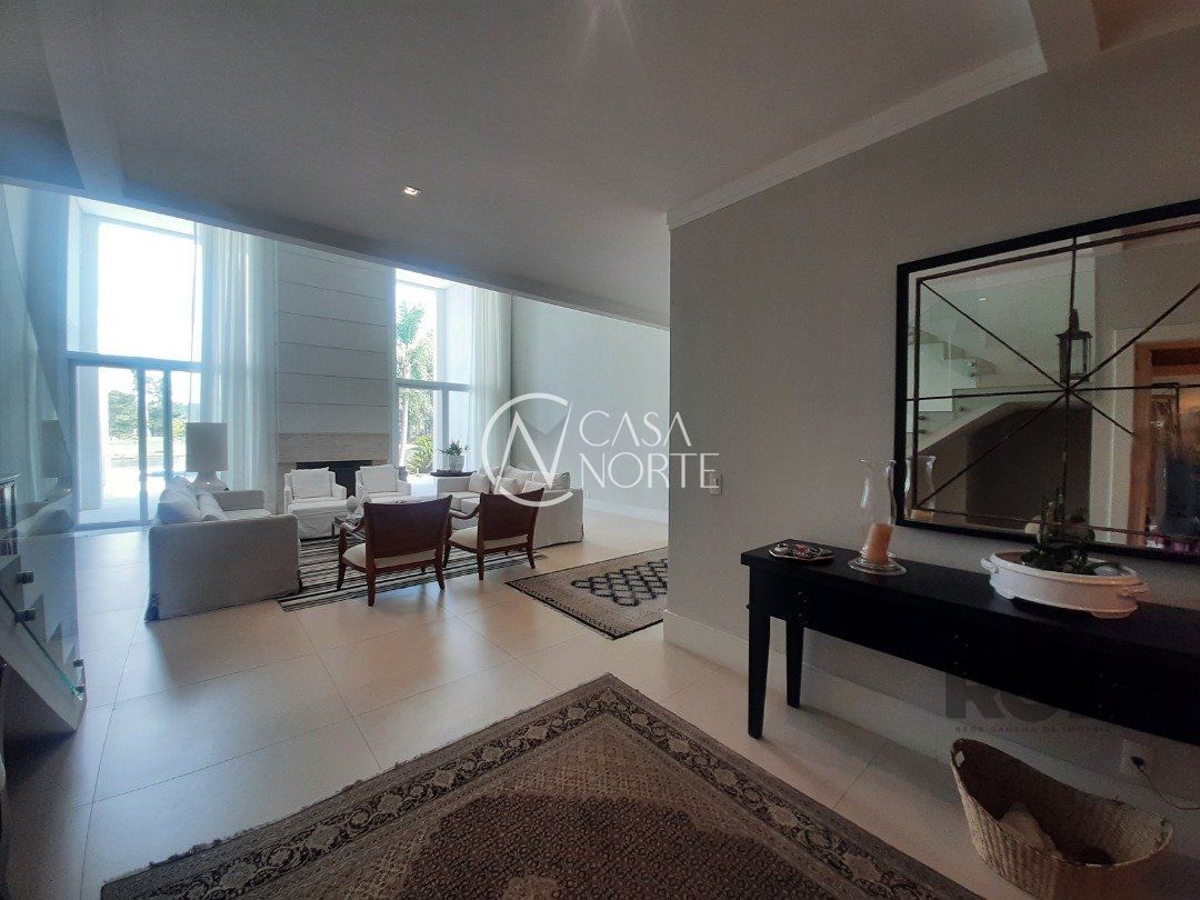 Casa de Condomínio à venda com 4 quartos, 423m², 4 suítes, 4 vagas, Avenida Juca Batista no bairro Belém Novo em Porto Alegre