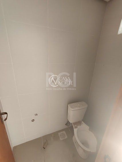 Casa à venda com 2 quartos, 140m², 2 suítes, 2 vagas, Rua Sargento Bruno Feldmann no bairro Guarujá em Porto Alegre