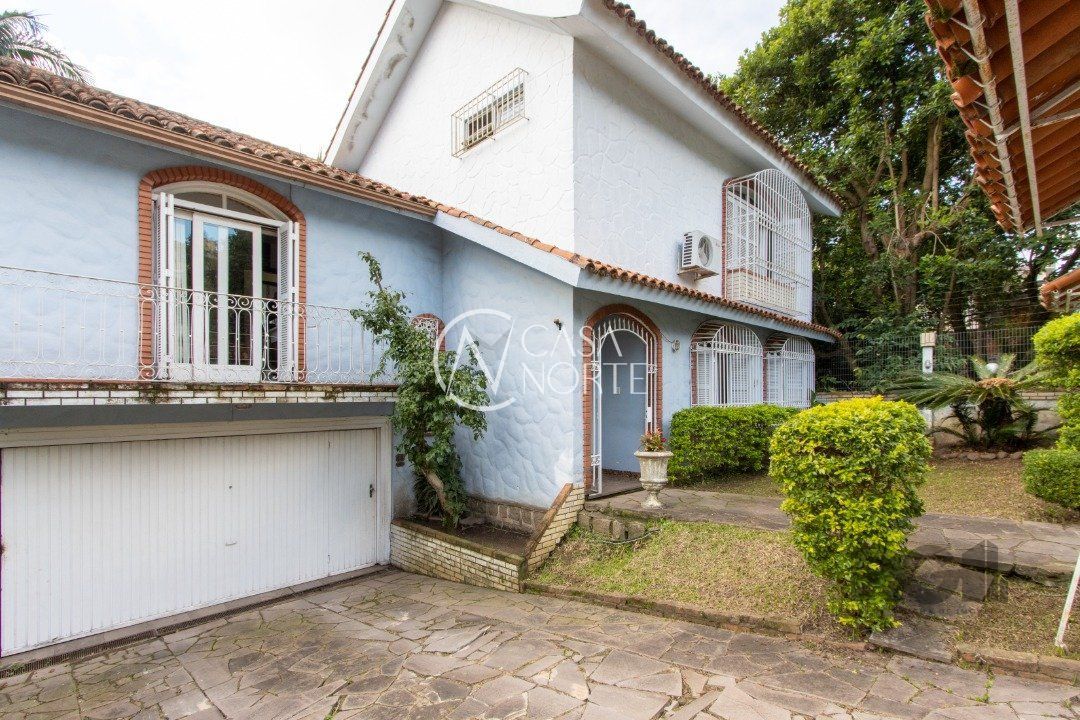 Casa à venda com 4 quartos, 180m², 1 suíte, 4 vagas, Rua Doutor Raul Moreira no bairro Cristal em Porto Alegre