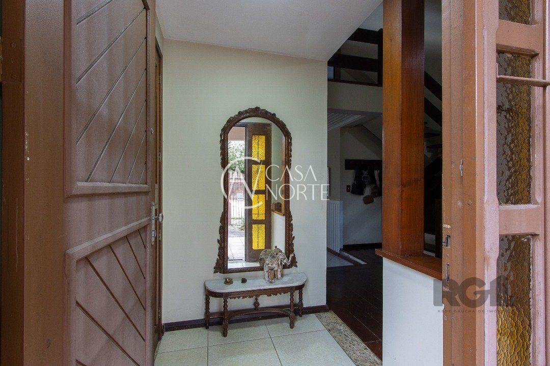 Casa à venda com 3 quartos, 247m², 1 suíte, 2 vagas, Rua Adao Pinheiro da Silva no bairro Ipanema em Porto Alegre