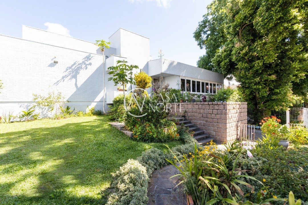 Casa à venda com 3 quartos, 405m², 3 suítes, 7 vagas, Rua Maraca no bairro Vila Assunção em Porto Alegre
