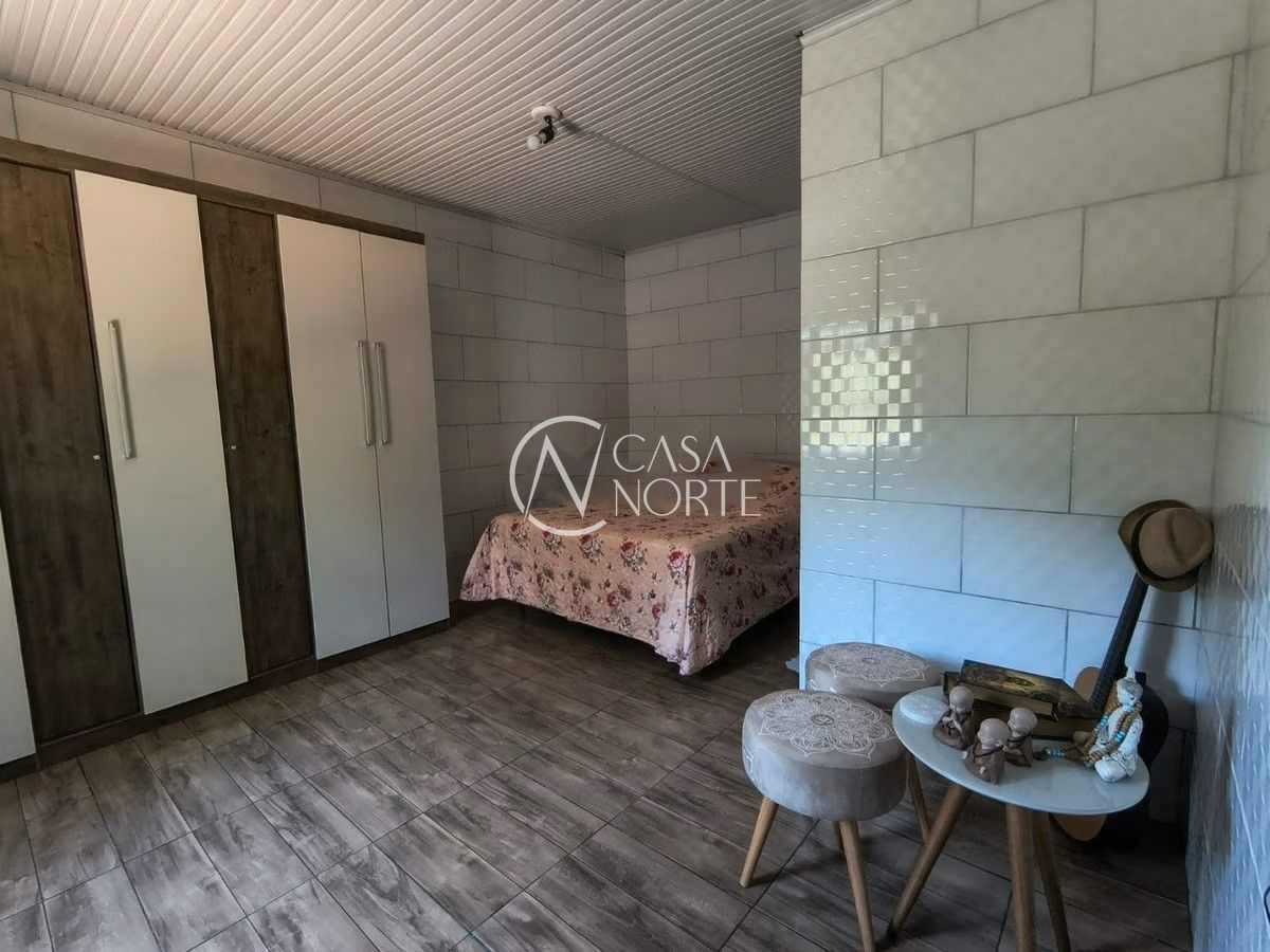 Casa à venda com 3 quartos, 210m², 1 suíte, 6 vagas, Rua Jerolomo Minuzo no bairro Vila Nova em Porto Alegre