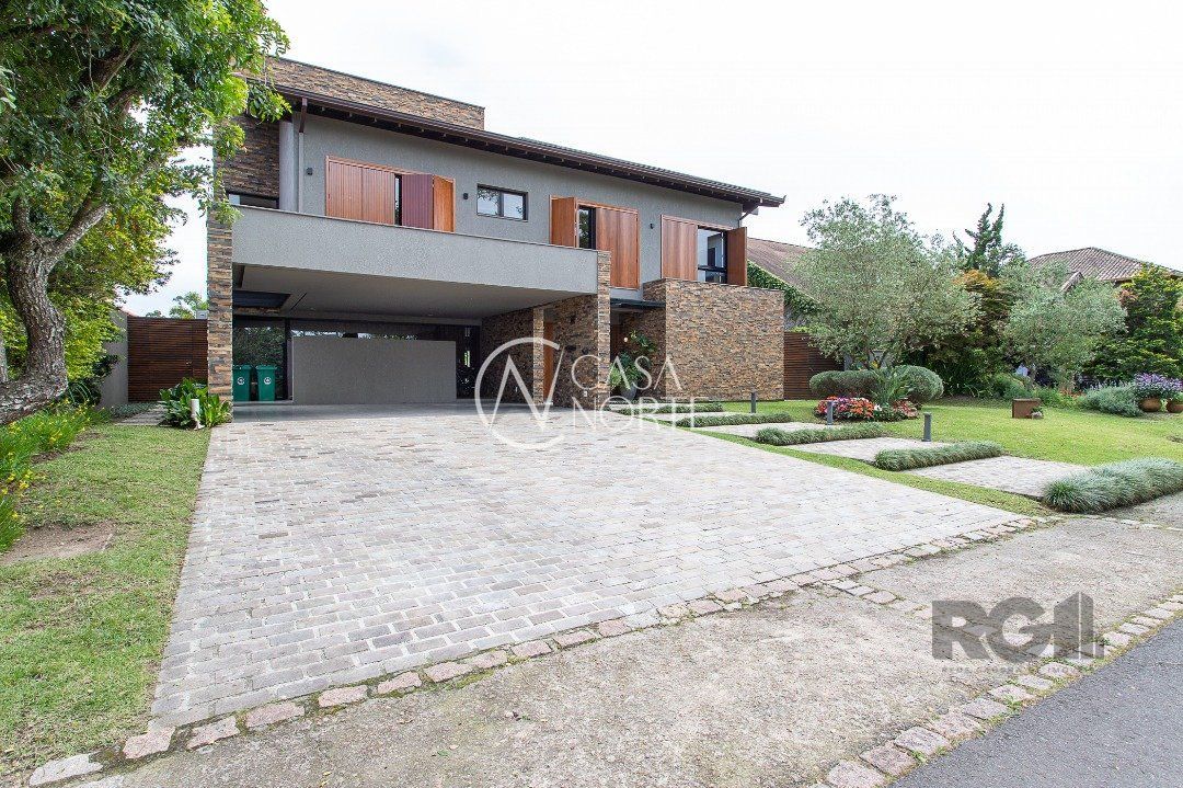 Casa de Condomínio à venda com 4 quartos, 460m², 4 suítes, 4 vagas, Avenida Juca Batista no bairro Terraville em Porto Alegre
