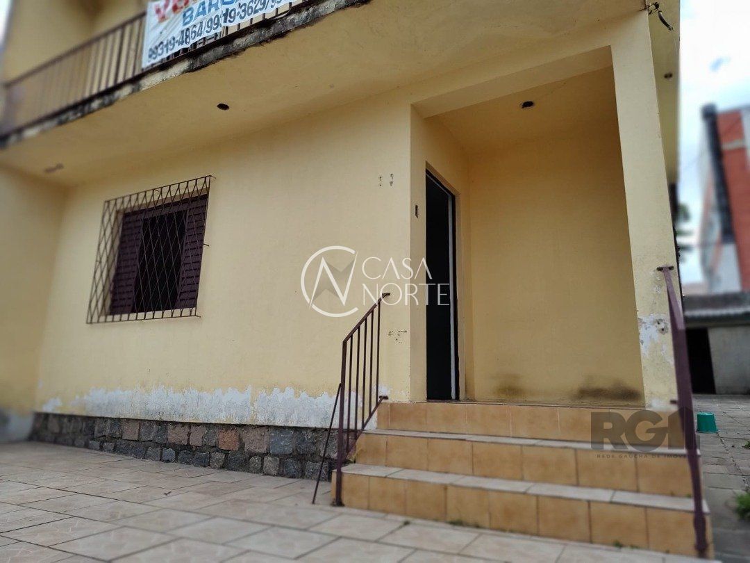 Casa à venda com 4 quartos, 247m², 4 vagas, Rua Joaquim Norberto no bairro Partenon em Porto Alegre