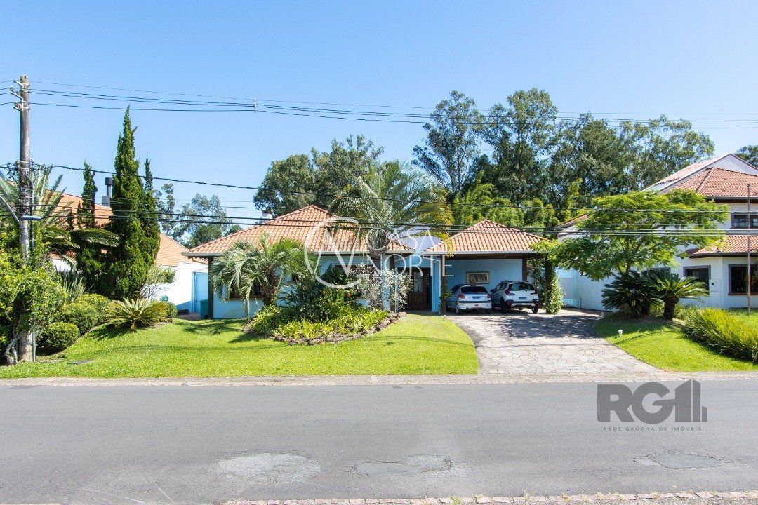 Casa de Condomínio à venda com 3 quartos, 250m², 3 suítes, 4 vagas, Avenida Juca Batista no bairro Belém Novo em Porto Alegre
