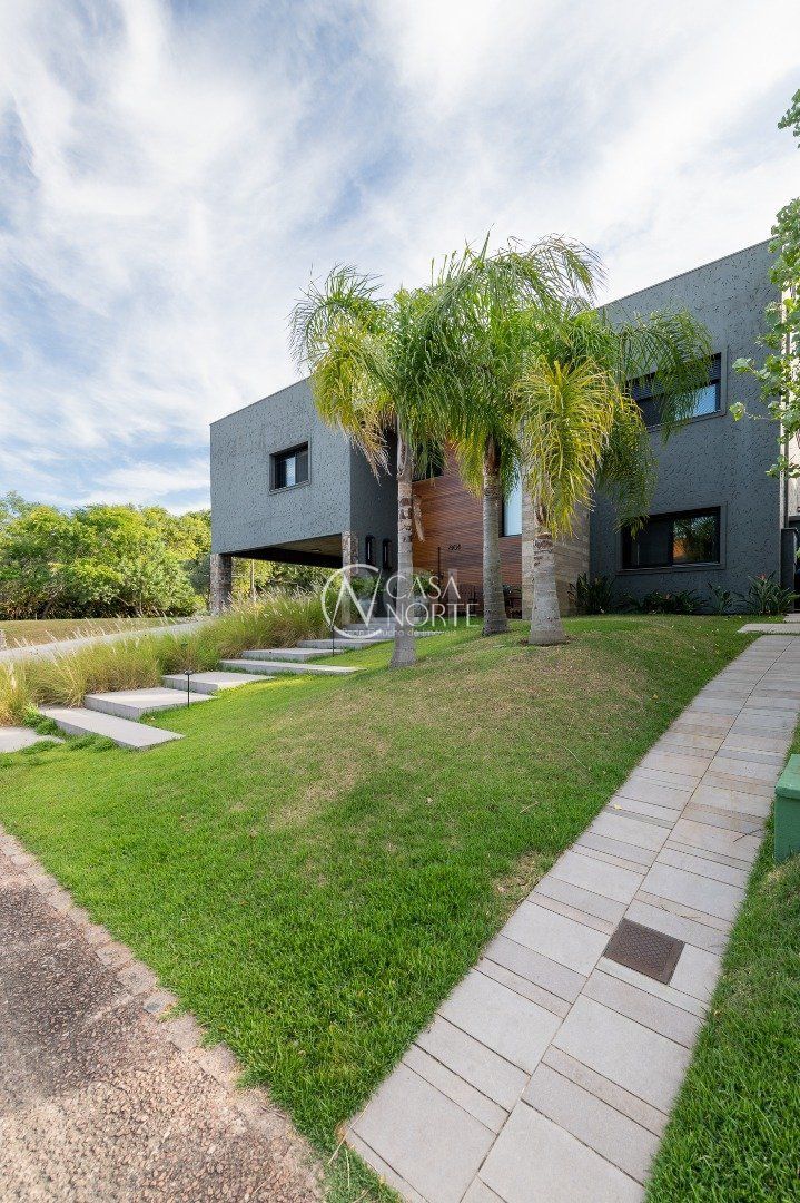 Casa de Condomínio à venda com 5 quartos, 550m², 4 suítes, 4 vagas, Avenida Juca Batista no bairro Belém Novo em Porto Alegre