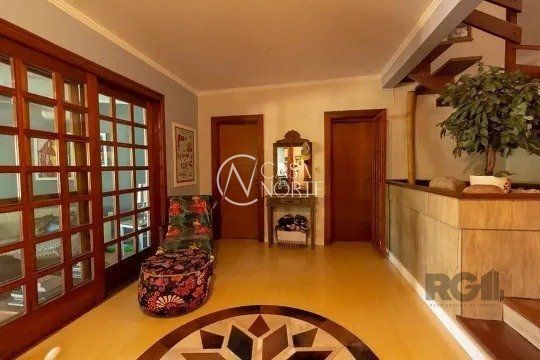 Casa à venda com 4 quartos, 350m², 1 suíte, 3 vagas, Rua Doutor Paulino Guerra no bairro Jardim Itu em Porto Alegre