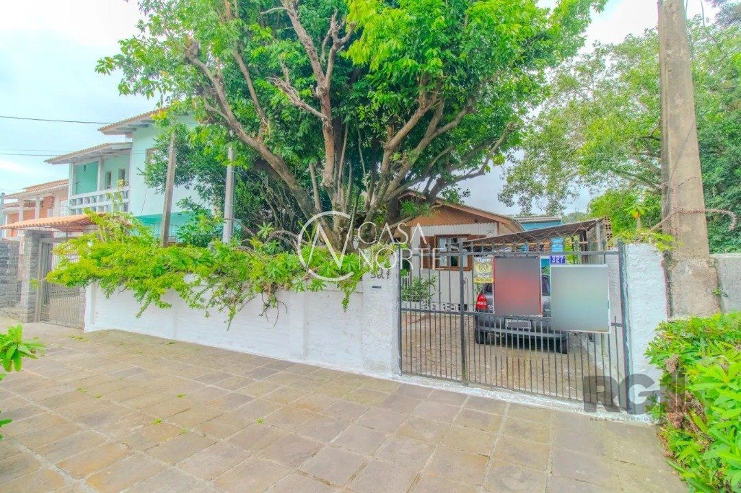 Casa à venda com 5 quartos, 251m², 3 vagas, Avenida Quarai no bairro Nonoai em Porto Alegre