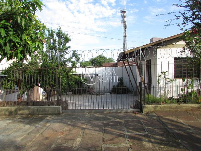 Casa à venda com 3 quartos, 158m², 1 suíte, 3 vagas, Rua Márcio Dias no bairro Nonoai em Porto Alegre