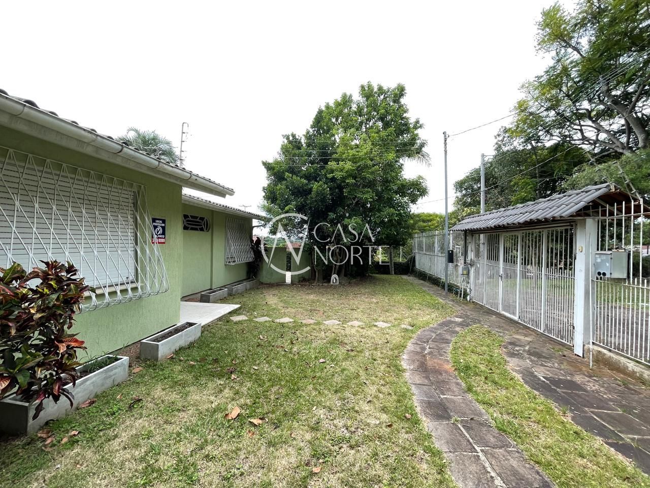 Casa à venda com 3 quartos, 287m², 5 vagas, Acesso dos Gerânios no bairro Santa Tereza em Porto Alegre