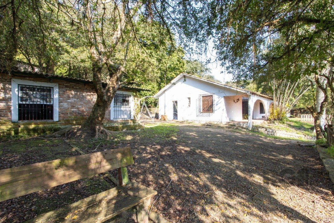 Casa à venda com 3 quartos, 350m², 1 suíte, 4 vagas, Avenida Beira Rio no bairro Belém Novo em Porto Alegre