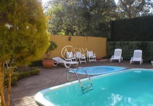 Casa de Condomínio à venda com 3 quartos, 121m², 1 suíte, 2 vagas, Rua Hubert Otto Krause no bairro Aberta dos Morros em Porto Alegre