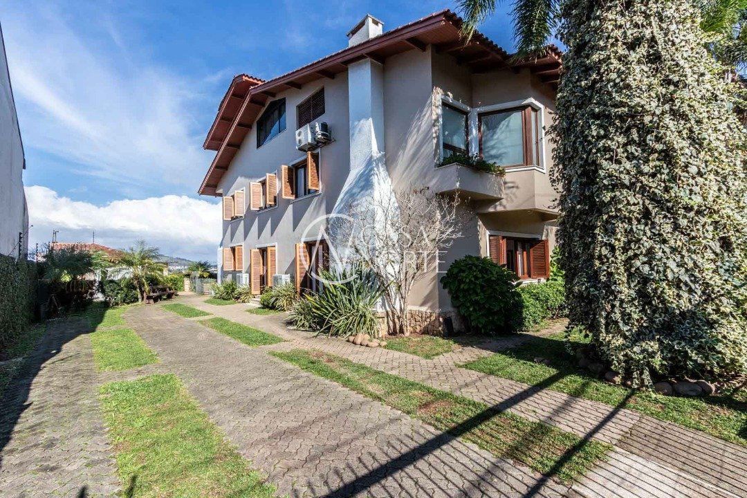 Casa à venda com 6 quartos, 960m², 5 suítes, 8 vagas, Rua Genny Zachia Stephanou no bairro Ipanema em Porto Alegre