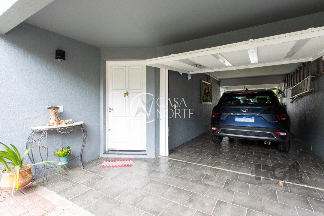 Casa à venda com 4 quartos, 306m², 1 suíte, 2 vagas, Rua Adão Pinheiro da Silva no bairro Ipanema em Porto Alegre