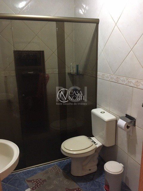 Casa à venda com 3 quartos, 140m², 2 vagas, Rua Vacaria no bairro Hípica em Porto Alegre