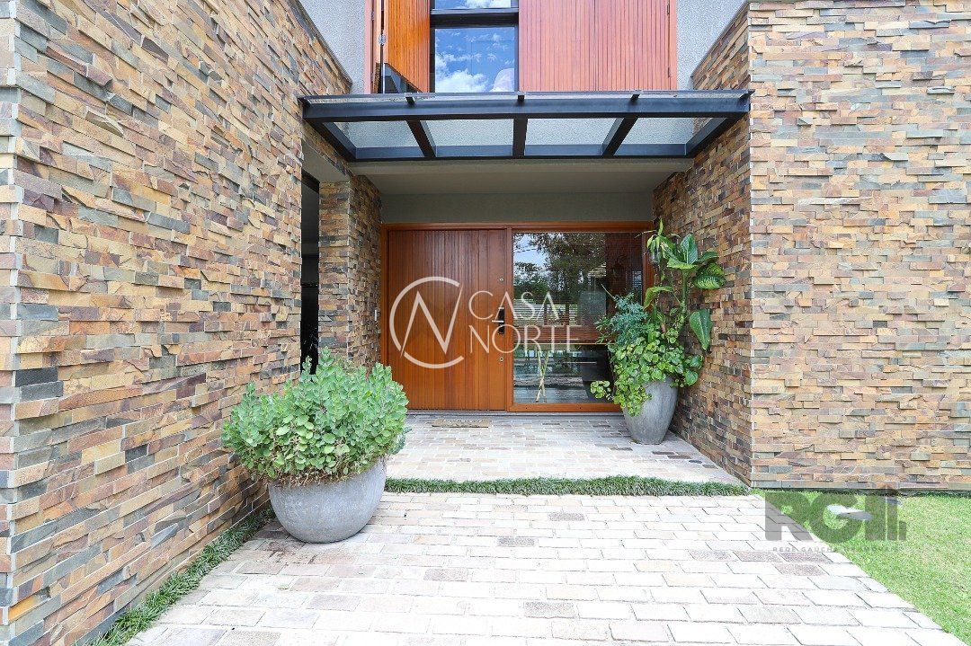 Casa de Condomínio à venda com 4 quartos, 460m², 4 suítes, 4 vagas, Avenida Juca Batista no bairro Terraville em Porto Alegre