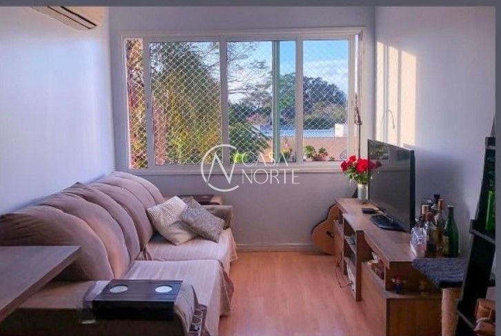Apartamento à venda com 2 quartos, 58m², 1 suíte, 1 vaga, Rua Coronel Aristides no bairro Camaquã em Porto Alegre