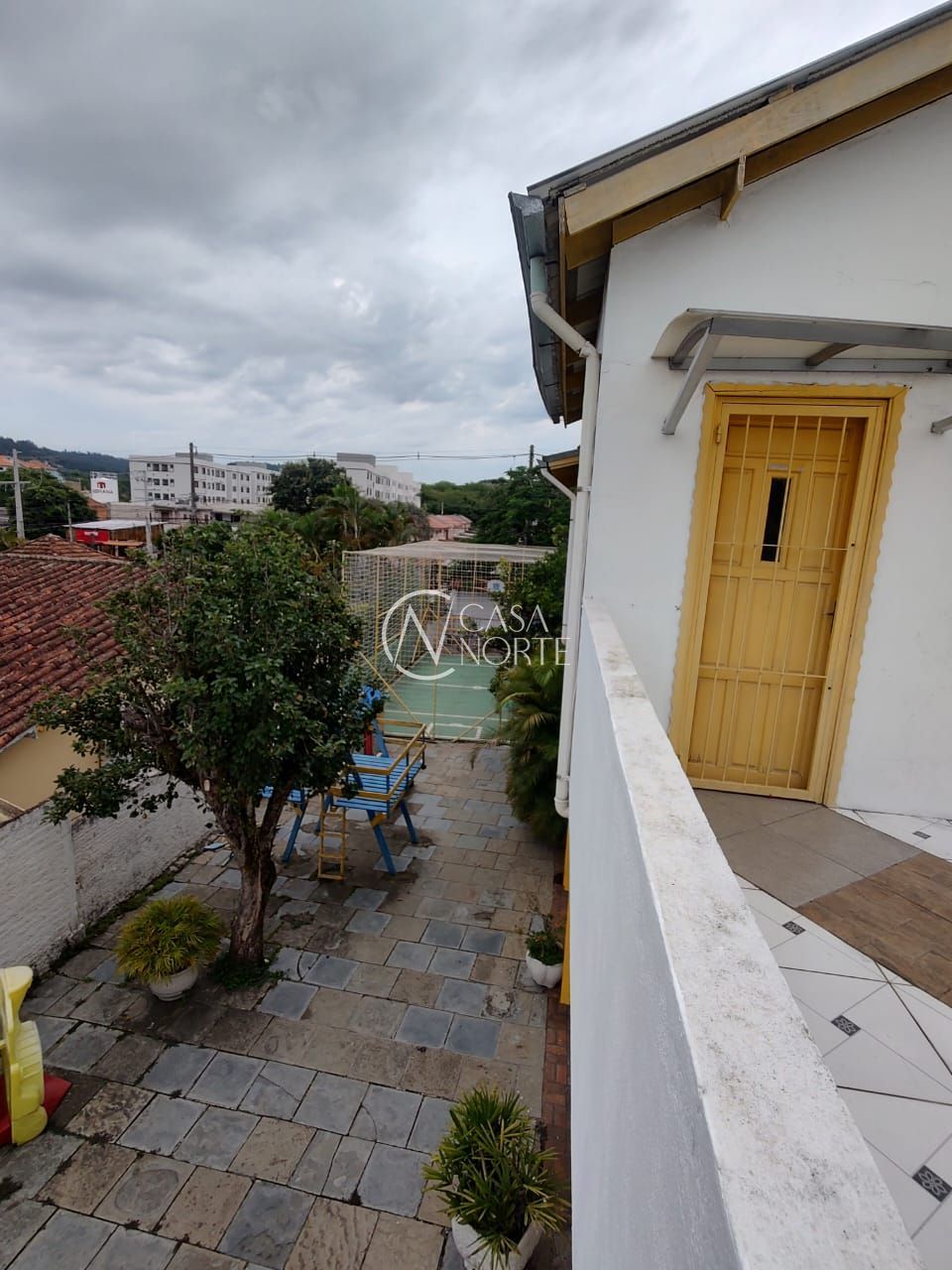 Prédio Comercial à venda com 4 quartos, 332m², Rua Atílio Supertti no bairro Vila Nova em Porto Alegre