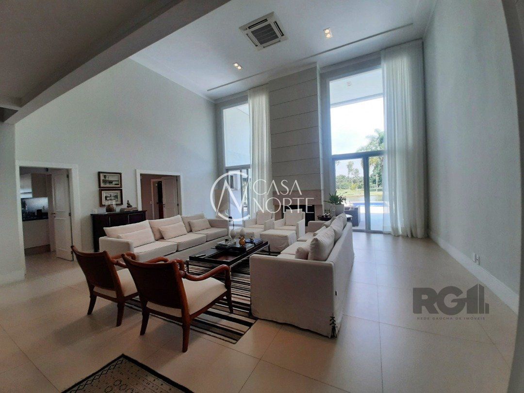 Casa de Condomínio à venda com 4 quartos, 423m², 4 suítes, 4 vagas, Avenida Juca Batista no bairro Belém Novo em Porto Alegre