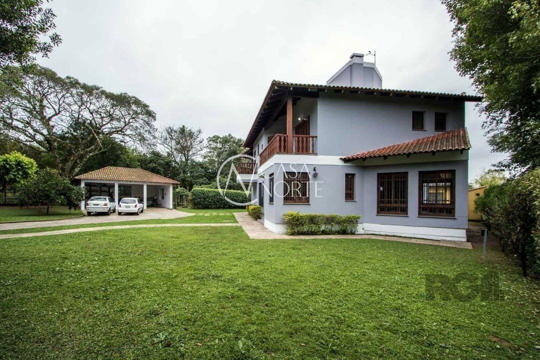 Casa à venda com 6 quartos, 321m², 6 suítes, 4 vagas, Estrada Costa Gama no bairro Belém Velho em Porto Alegre