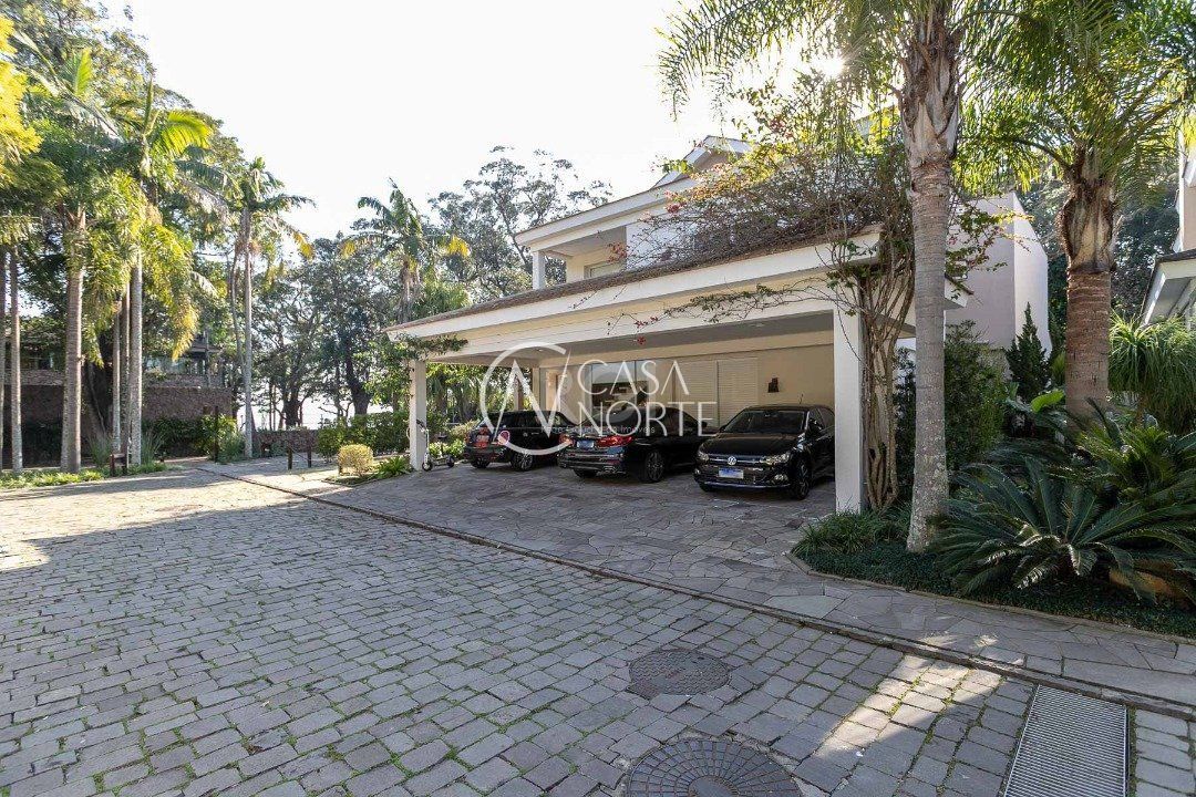 Casa de Condomínio à venda com 4 quartos, 588m², 4 suítes, 5 vagas, Avenida Coronel Marcos no bairro Pedra Redonda em Porto Alegre